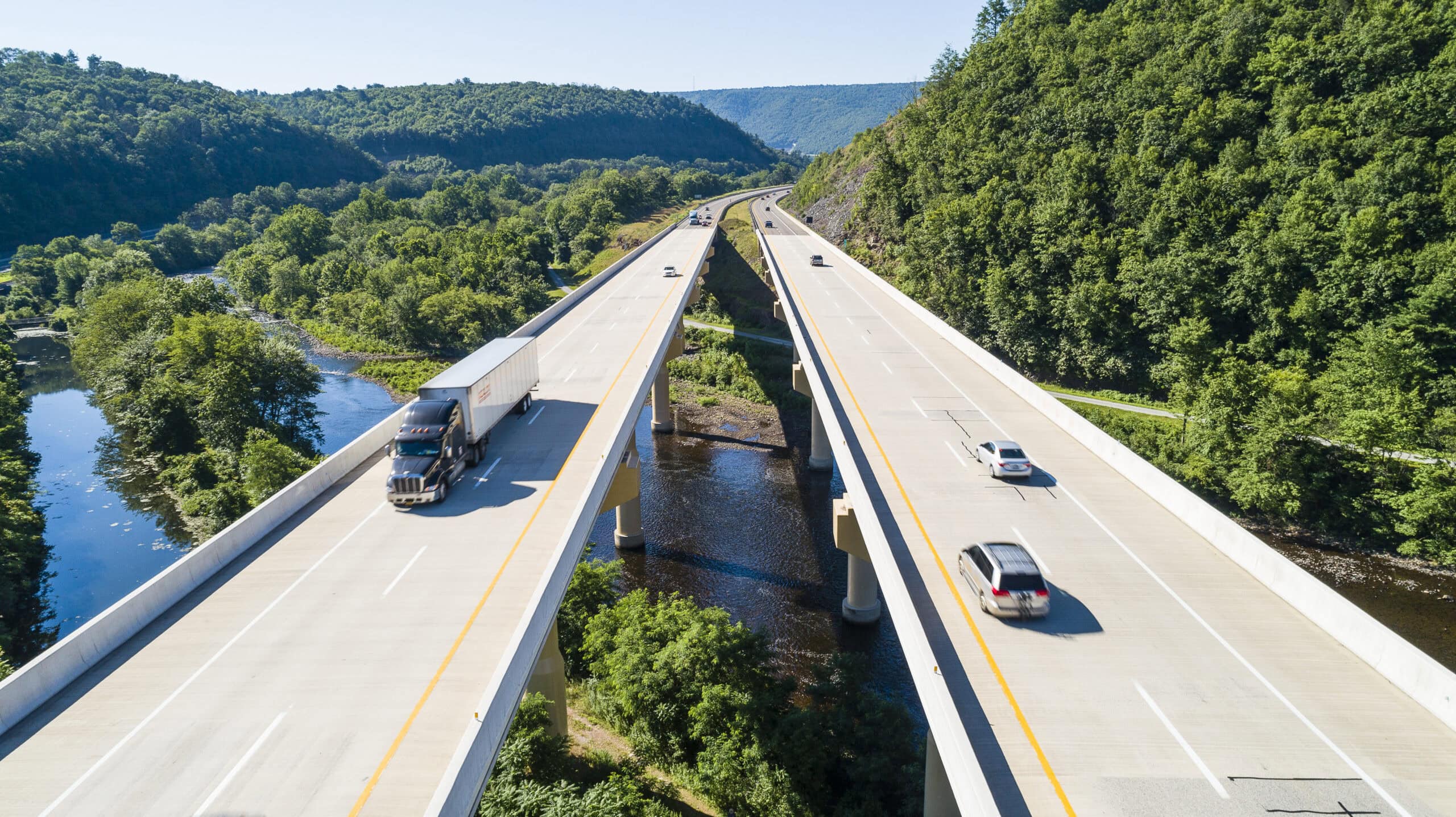 Medium and heavy duty fleets driving on a highway using alternative fuels and refined products